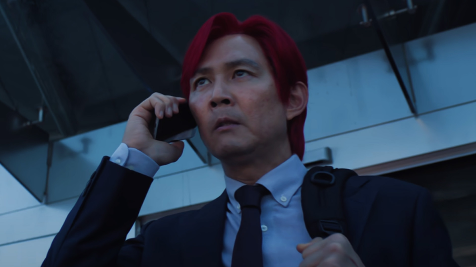 Seong Gi-hun (played by Lee Jung-jae) returns for the second season of the wildly popular Squid Game. The red hair's distracting, though.