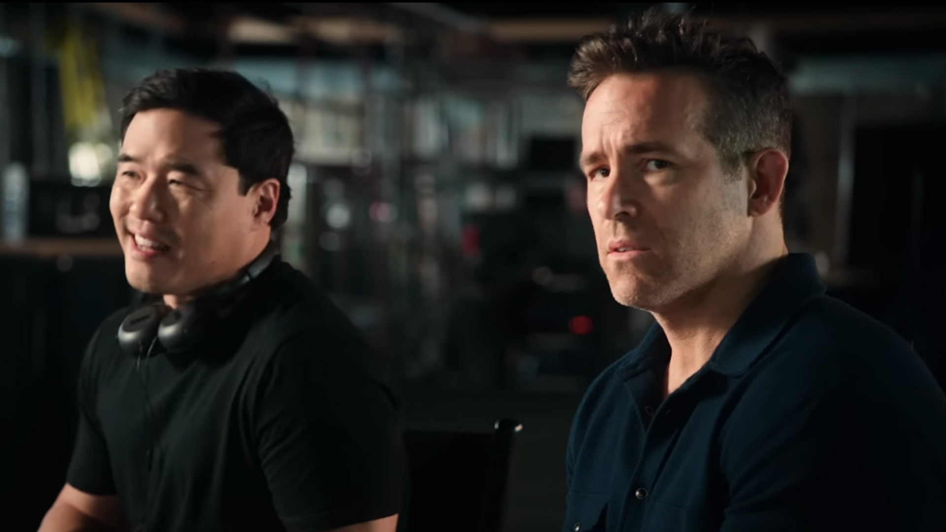 The BTS clip with the visibly confused Ryan Reynolds and director "John Krasinski" (played by Randall Park) was released during the Super Bowl.