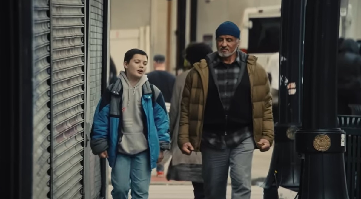 Sylvester Stallone's character is coaxed out of hiding by his 13-year-old neighbor.